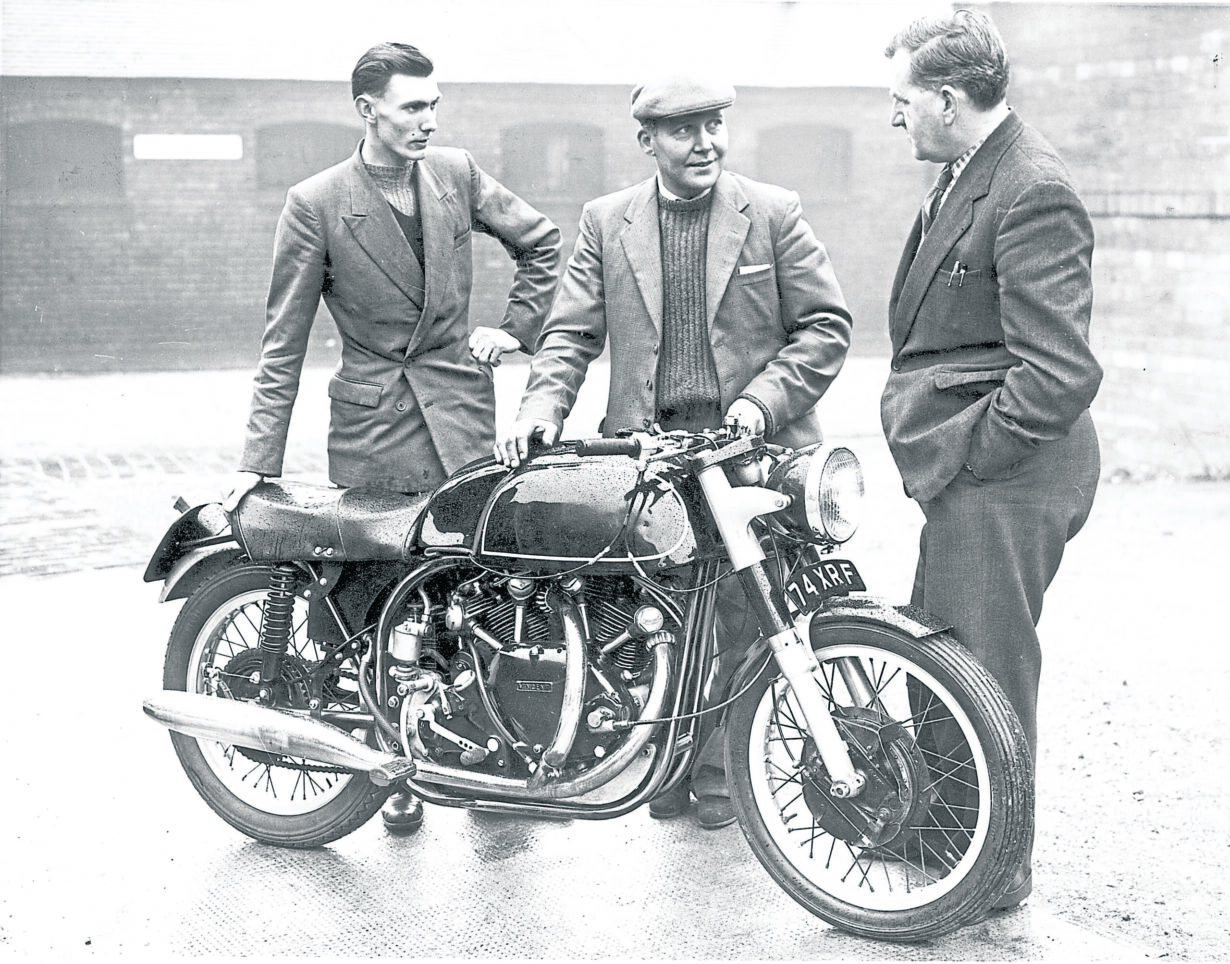 Tom Somerton (centre) shows off a Viscount to Bob Currie (right) of The Motor Cycle.